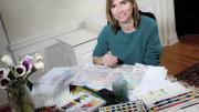 At home in Cambridge, Stossel works at her dining-room table.