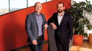Yates (left) and Laskey have merged their talents—computer science and political communications—in Opower.