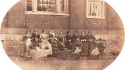 A group portrait of the College housekeepers, then known as “goodies”