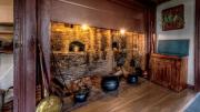 The kitchen at Hawthorne’s birth home, restored to reflects its original design, has an open hearth.