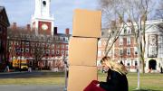 Photograph of student moving out of Eliot House for coronavirus social distancing