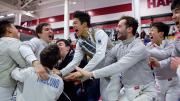 fencers celebrate a championship win