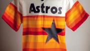 Photo of red, white, and orange Houston Astros jersey from 1983 worn by pitcher Joe Niekro