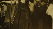 Blanche Calloway spreading her arms during a performance