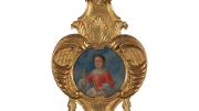 portrait of young girl surrounded by ornate gold-painted frame