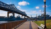 Boardwalk by Taunton River and Braga Bridge overhead