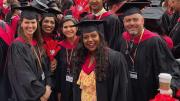 Harvard students in caps and gowns 