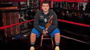 Victor A. Lopez sits in a boxing ring