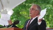 U.S. Representative Barney Frank holding up a copy of the Marshall speech from 1947.