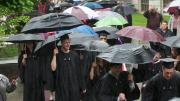 Baccalaureate-bound seniors brave the weather en route to Memorial Church.