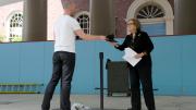The orators rehearse the order of events in advance of the big day.