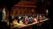 The Radcliffe Choral Society sings behind the Phi Beta Kappa officials, honored guests, and speakers during the literary exercises in Sanders Theatre. 
