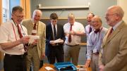 From left: David Otto, Bruce Johnson, Xandy Walsh, Alex Walsh, John Fryer ’63, Tony Rossmann, and Paul Bamberg