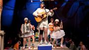 Emily Casey, Sean Pfautsch, Matt Kahler, Ryan Bourque, and Dana Omar. Kahaler, standing on the cooler, plays the Major General. 