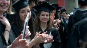 The Phi Beta Kappa undergraduates, enjoying what may be the best of the week’s weather, gather outside Sanders Theatre for the entry procession.
