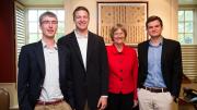 Harvard President Drew Faust greets the winners of the President's Challenge for social entrepreneurship in her office, in advance of the public announcement of their win. Florian Mayr '13 (from left), Matthew Polega '13, Drew Faust, and Scott Crouch '13 are pictured in Massachusetts Hall.