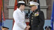 Ensign Catherine Philbin is congratulated by Colonel Bruce Martin, USMC (ret), who administered her oath of office.