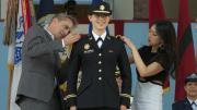 Sophia Chua-Rubenfeld’s parents pin on her insignia.
