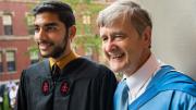 Dean David N. Hempton and a graduating student