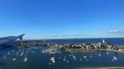 Photograph of boats at anchor on the approach to Boston’s Logan Airportn