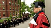 Shepherd and flock: at Memorial Church, the Reverend Peter J. Gomes awaits arrivals for the senior class chapel service.