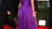 Sandra Bullock arrives at the 2010 Golden Globe Awards in a violet Bottega Veneta gown.
