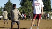 Varsity midfielder Adam Rousmaniere ’10 also volunteered with the program last summer, in Malawi.