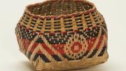 A basket, signed “Scarlett Darden 2002,” by one of Clara Darden’s descendants, displays an X with bull's-eye design pattern: "Waxtik Kani."