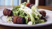 Tangy greens with bacon-wrapped dates