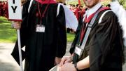 “Angels” Charles Jacob Buehler, M.T.S. (left), and John Hudspeth Davidson, M.Div., helped lead the Divinity School  contingent.