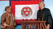 Presidents Ellen Johnson Sirleaf and Drew Faust with a gift from Liberia
