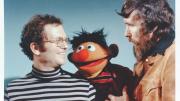 A younger Cerf with Muppeteer Jim Henson (right) and Muppet Ernie.