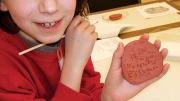 Do-it-yourself cuneiform at the Peabody Museum’s Wonders of Writing family event