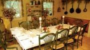 Meals are served at two communal tables in the restored barn.