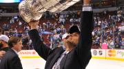 Photograph by Brian Babineau/Boston Bruins The Bruins' Don Sweeney '88 hoists the Stanley Cup.