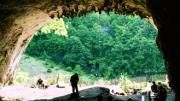 Views from inside and outside Dzudzuana Cave in the Republic of Georgia. Bar-Yosef and colleagues are working to date the Middle to Upper Paleolithic transition here in the Caucasus foothills, where it may have occurred much later than in other parts of Europe. 