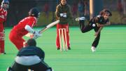 A bowler delivers.