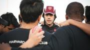 Ibrahim Khan &rsquo;14 talks strategy with teammates before a game against Boston University in May. 