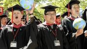 Ready to take on the world are Harvard Kennedy School class marshals Theodore Zagraniski (M.P.A.), I-Chun Hsiao (M.P.P.), and Jonathan Chang (M.P.A.).