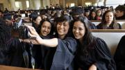 Memorial Church memories: a Baccalaureate-service selfie encompasses seniors Raina Gandhi, Jen Zhu, and Maria Barragan-Santana.