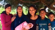 Global Health Equity Option Scholar Hanna Amanuel '16 (center) with a local family in Sierra Madre de Chiapas, Mexico. Amanuel spent this spring semester working with Compañeros En Salud México, Partners in Health's sister organization in Chiapas, as part of a new study-abroad program.