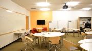 Room B-30 in Lamont Library is a collaborative learning space featuring dual overhead projection and moveable furnishings.