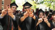 Class of 2015 First Marshal Sietse Goffard, of Bedford, Texas, with fellow class leaders Bob Wu of Sydney, Australia, Casey Fleeter, of Columbus, Ohio, and Christina Nguyen, of Irvine, California, XVing their Commencement pride