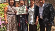 Lenica Morales-Valenzuela ’15 celebrates graduation with her family.