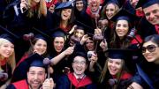 Law School graduates flaunt their profession’s symbol of authority.