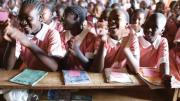 ZanaAfrica works with local, school-affiliated organizations in Kenya to reach young girls, like these students, who may need supplies and information.