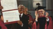 Photograph of Nelson Mandela receiving honorary degree and University Marshal Rick Hunt