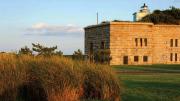 Sunset view of Fort Taber Park and the exterior of Civil War-ere Fort Rodman 