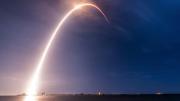 A time-lapse exposure of the SpaceX rocket carrying TEMPO into orbit reveals an arc of light against the sky.