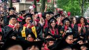 Graduate School students celebrating Commencement